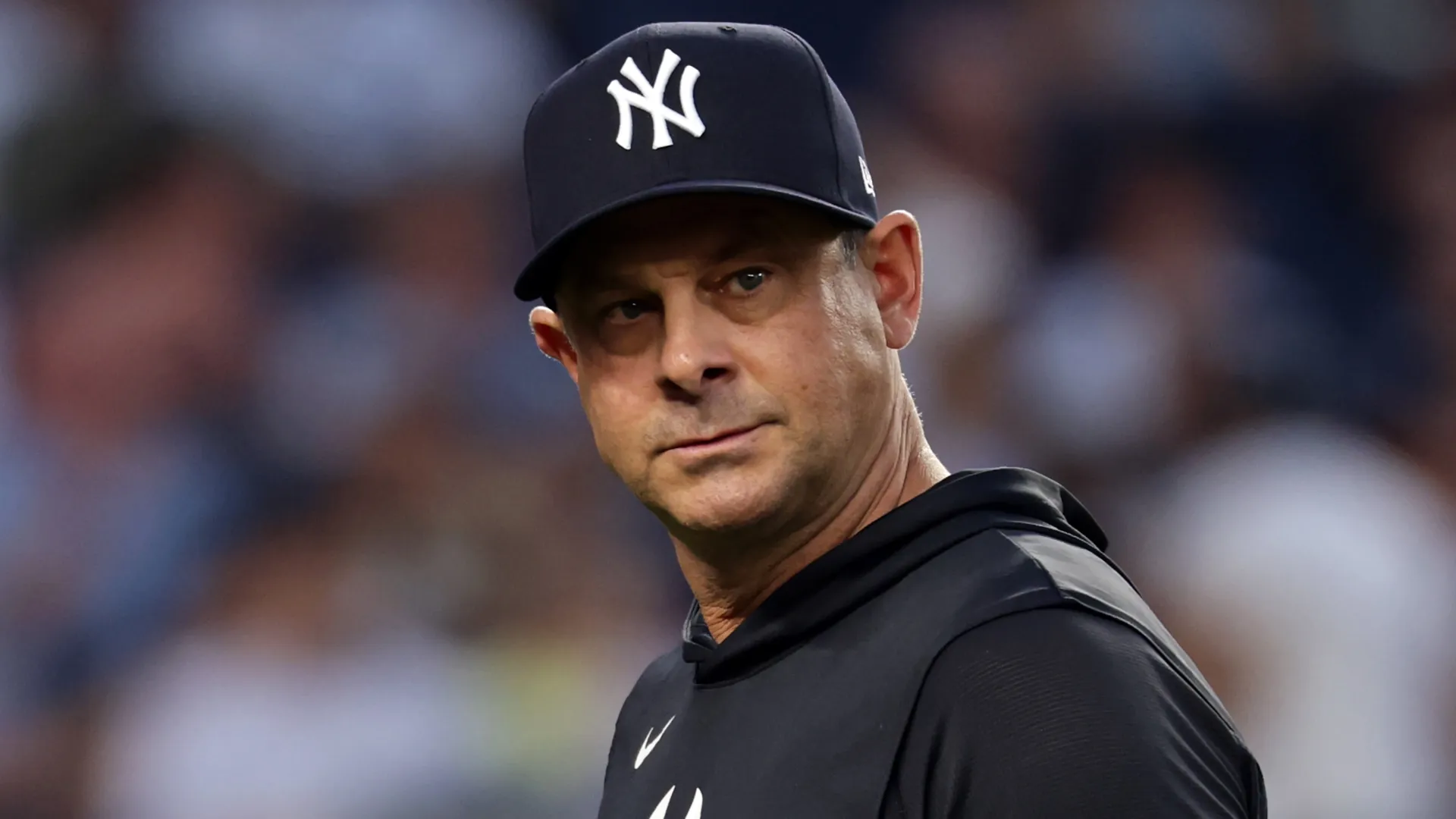 Aaron Boone looks on