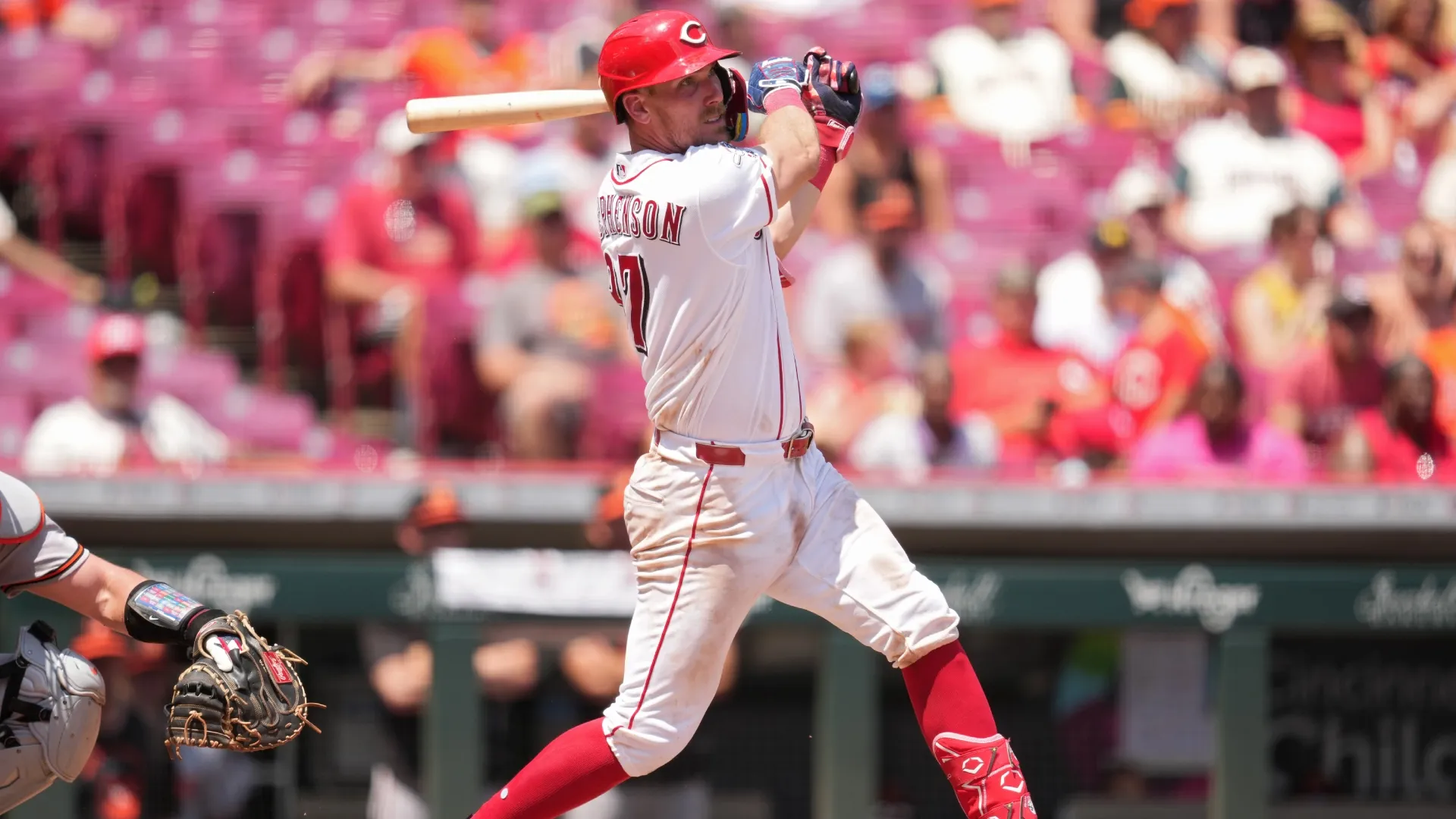 Tyler Stephenson #37 of the Cincinnati Reds watches his single. Jeff Dean/Getty Images