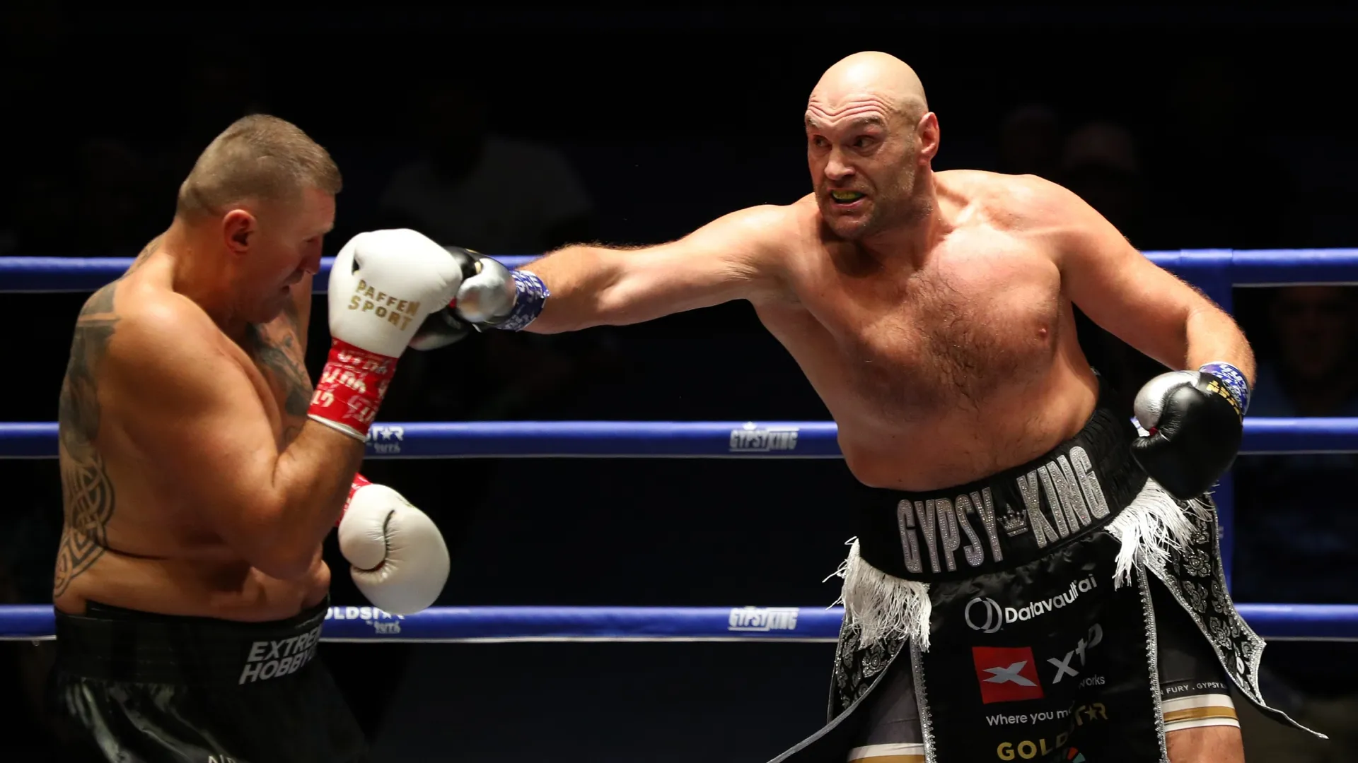 Tyson Fury punches Mariusz Wach. Thananuwat Srirasant/Getty Images