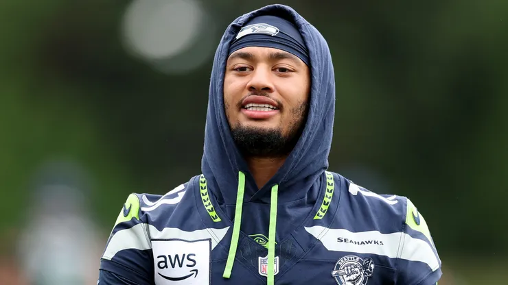 Jaxon Smith-Njigba #11 of the Seattle Seahawks works out during practice.