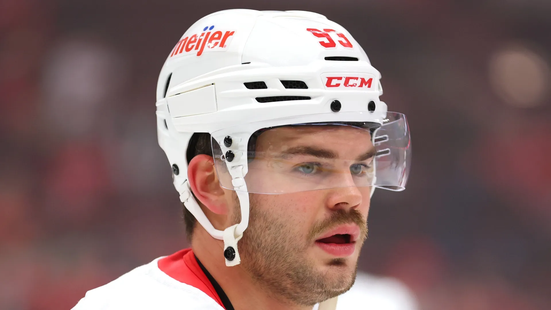 Alex DeBrincat #93 of the Detroit Red Wings looks on prior to the game against the Chicago Blackhawks at the United Center on November 06, 2024 in Chicago, Illinois.