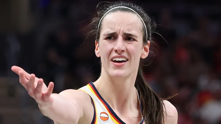 Caitlin Clark #22 of the Indiana Fever complains about a foul during.