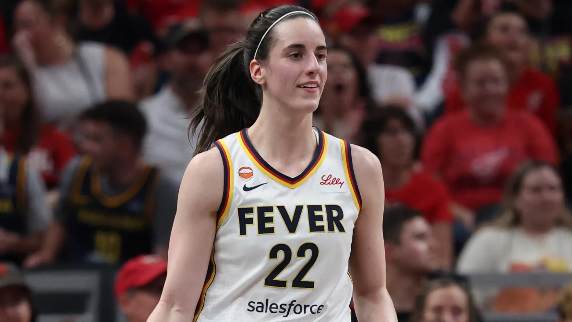 Caitlin Clark #22 of the Indiana Fever dribbles the ball against the Connecticut Sun (Source: Andy Lyons/Getty Images)