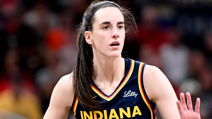 Caitlin Clark #22 of the Indiana Fever dribbles against the New York Liberty