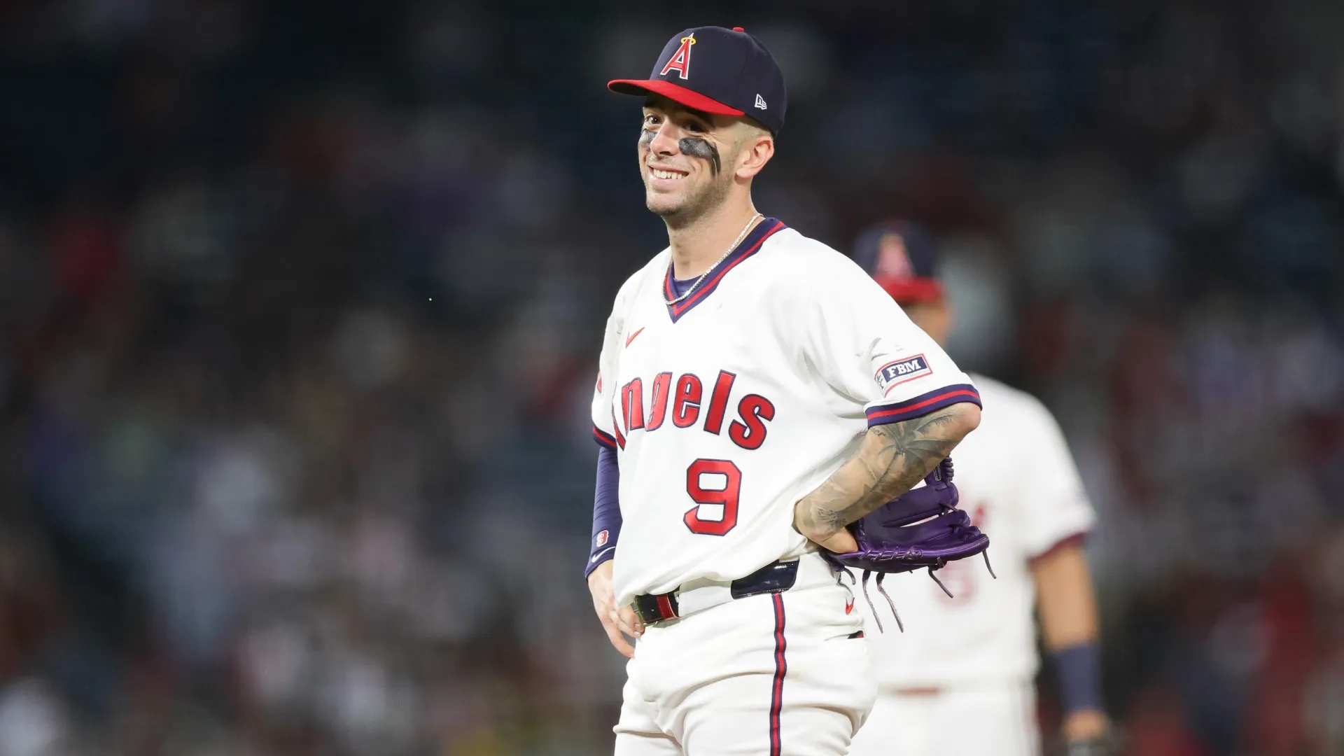 Zach Neto #9 of the Los Angeles Angels reacts during an MLB game. Ryan Sirius Sun/Getty Images