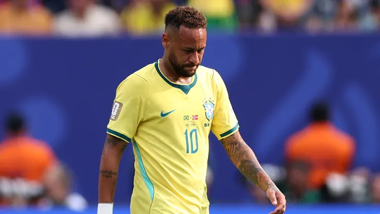 Neymar Jr #10 of Brazil reacts after conceding a first goal to Erling Haaland #9.
