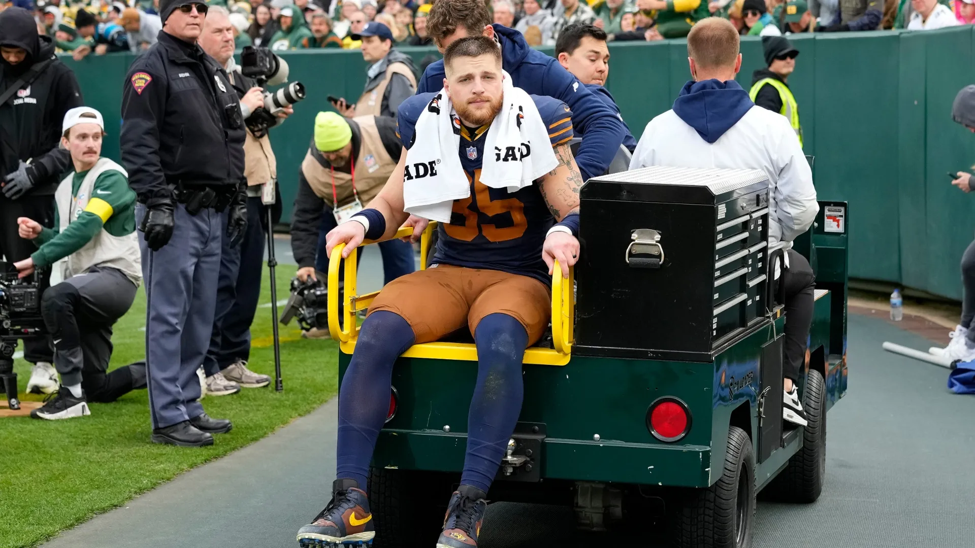 Tucker Kraft leaves the field after injury