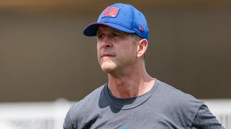 Head coach John Harbaugh of the New York Giants looks on during training camp.