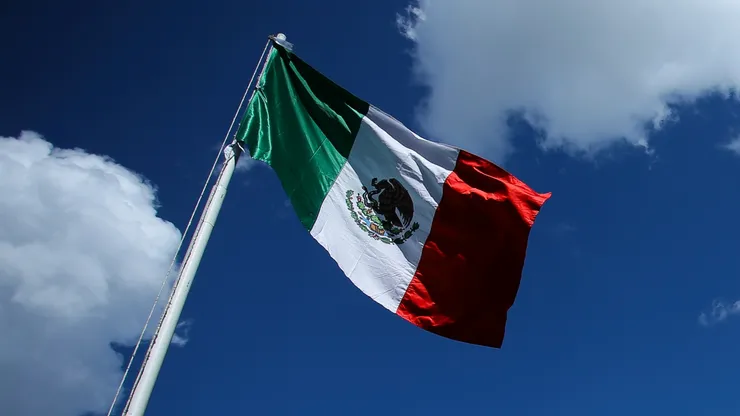 General view of the mexican flag waving at La Corregidora stadium