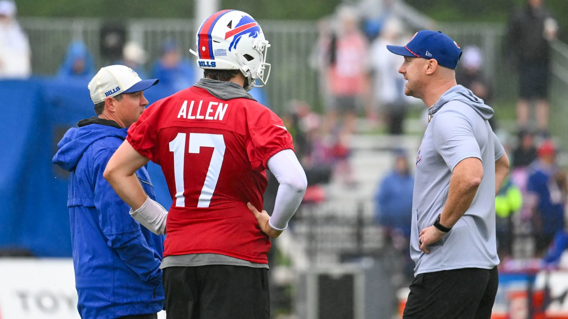 Joe Brady talking with Josh Allen