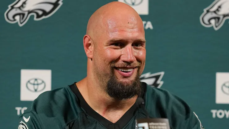 Lane Johnson #65 of the Philadelphia Eagles talks to the media.