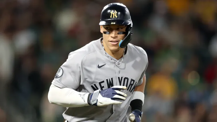 Aaron Judge #99 of the New York Yankees jogs to first base.