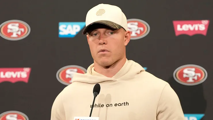 Christian McCaffrey #23 of the San Francisco 49ers talks with the media.