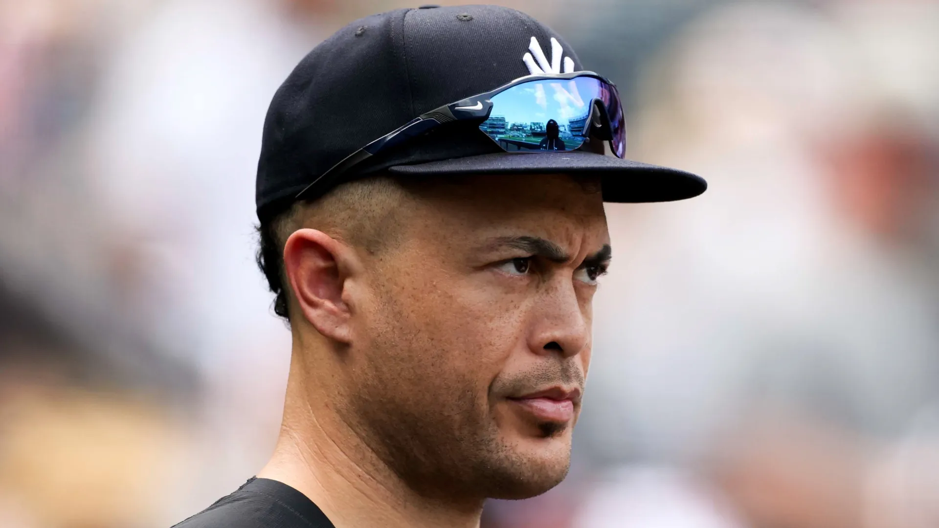 Giancarlo Stanton #27 outfield the New York Yankees looks on during the fifth inning against the Detroit Tigers at Yankee Stadium on July 01, 2026 in New York City.