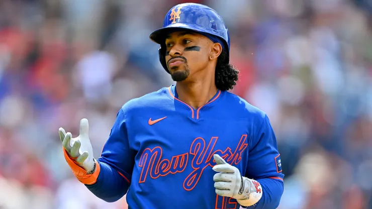 Francisco Lindor #12 of the New York Mets celebrates as he rounds the bases on a three-run homer.
