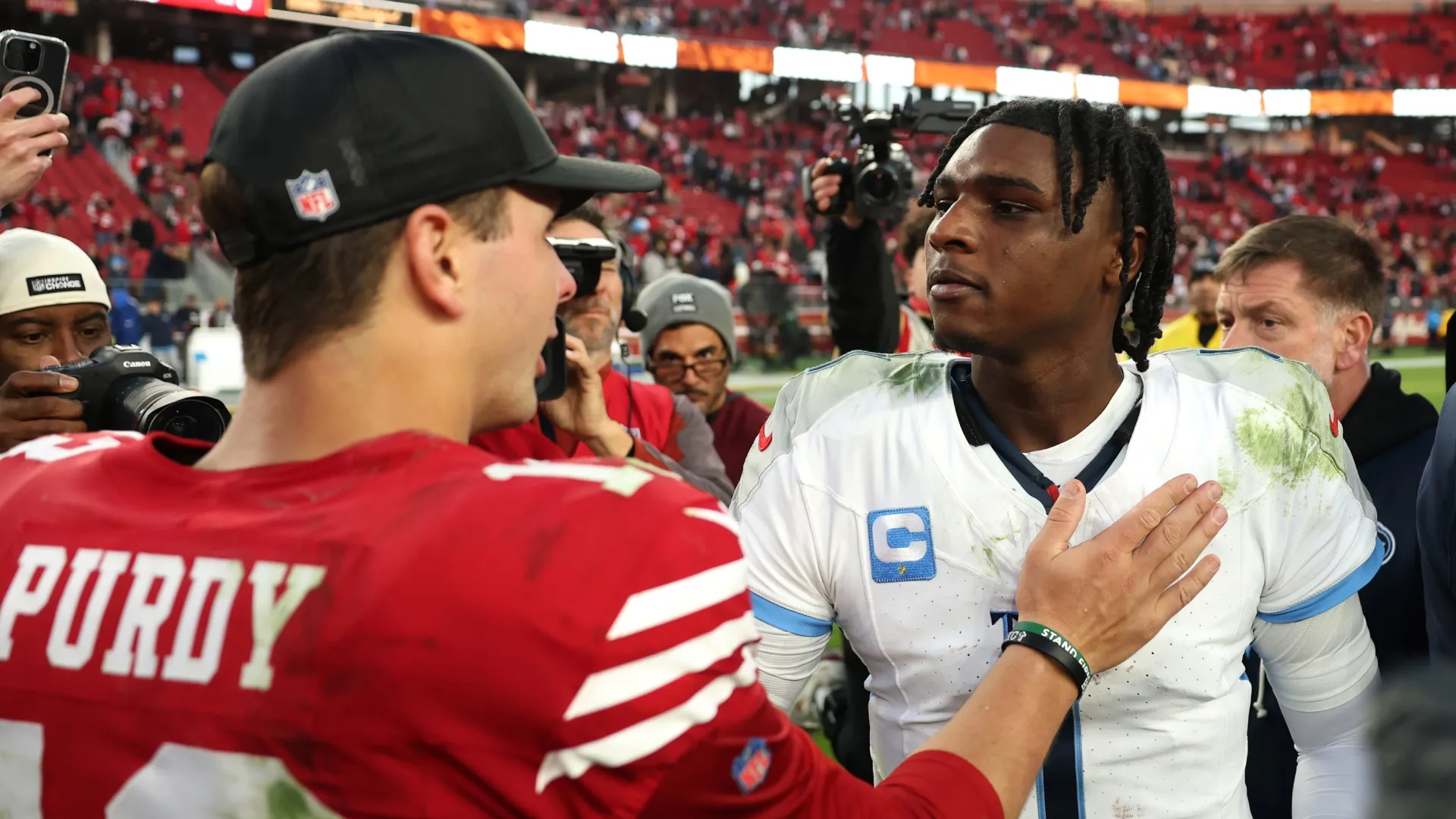 Brock Purdy and Cam Ward during the 2025 NFL season.