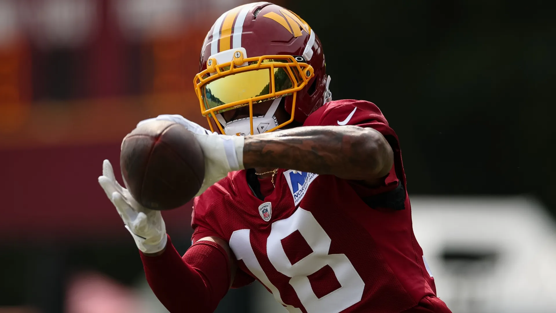 Stefon Diggs #18 of the Washington Commanders participates in a drill during a joint practice (Source: Scott Taetsch/Getty Images)