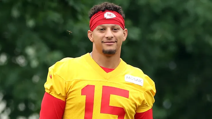 Patrick Mahomes #15 walks toward the practice field.