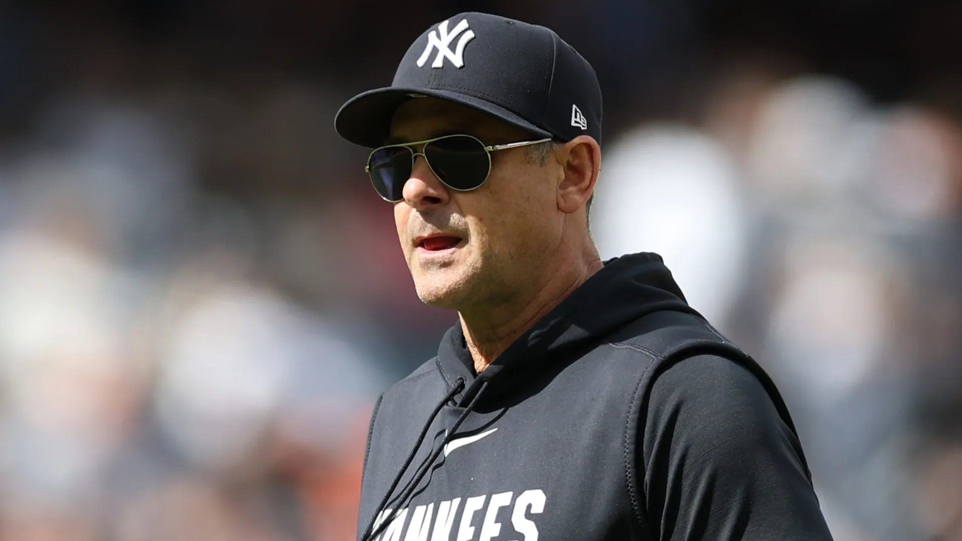 Aaron Boone looks on