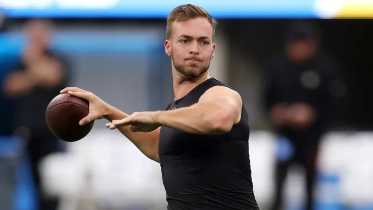 Jake Haener #14 warms up prior to the preseason.