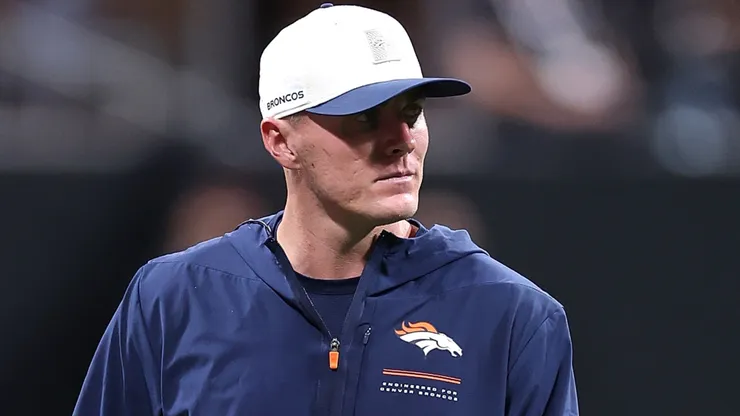 Bo Nix #10 of the Denver Broncos looks on at the end of the first quarter of a NFL preseason game.
