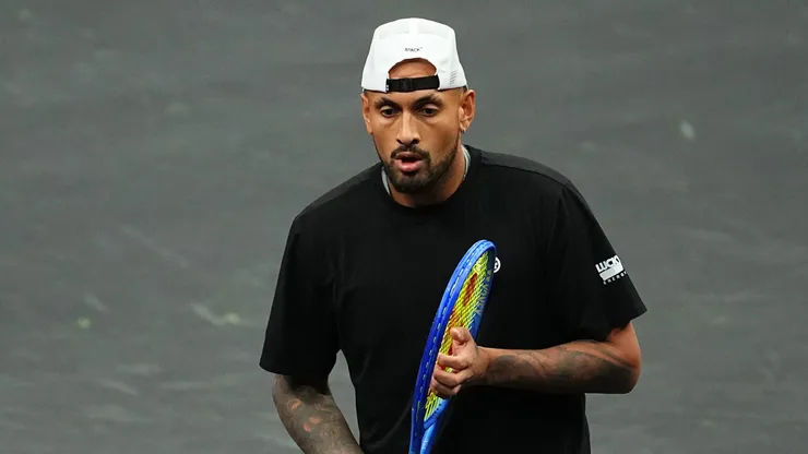 Nick Kyrgios of Australia looks on.