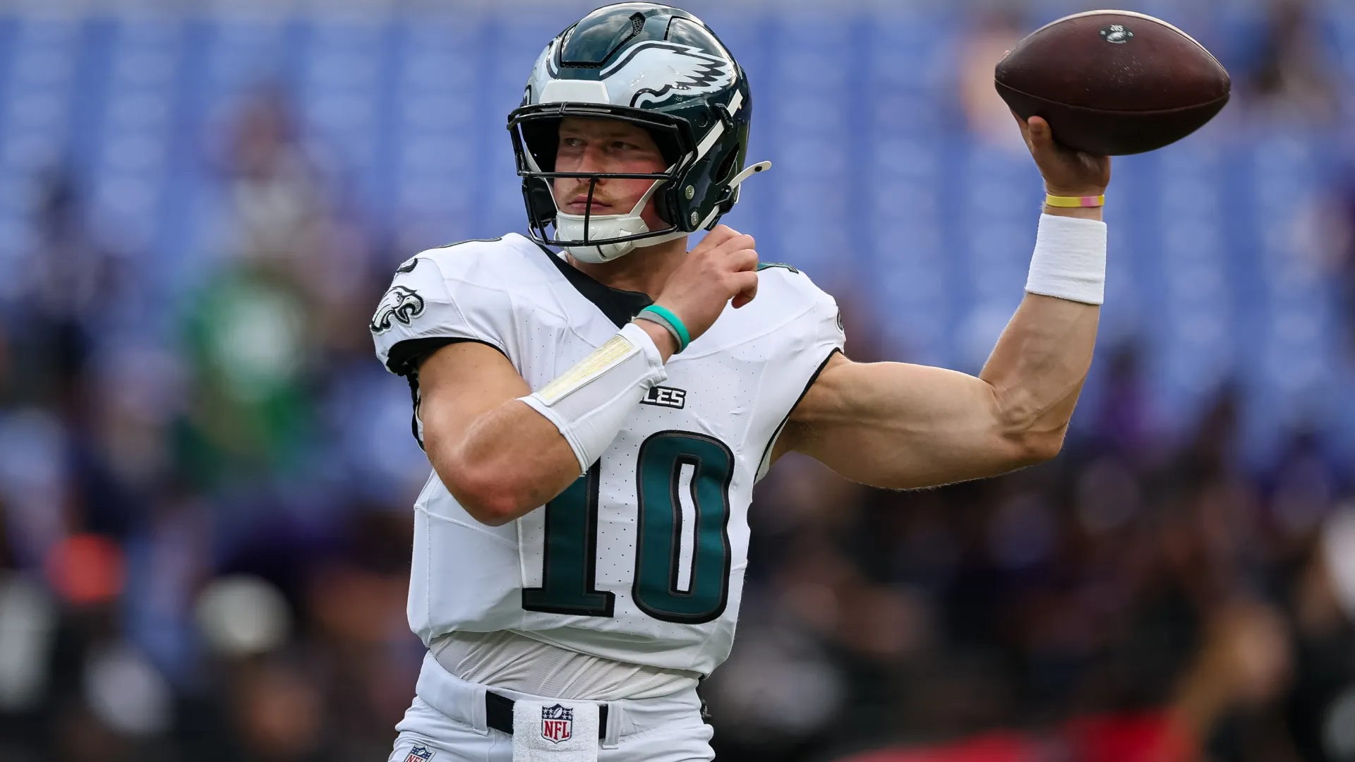 Cole Payton #10 of the Eagles attempts a pass before the preseason game (Source: Scott Taetsch/Getty Images)
