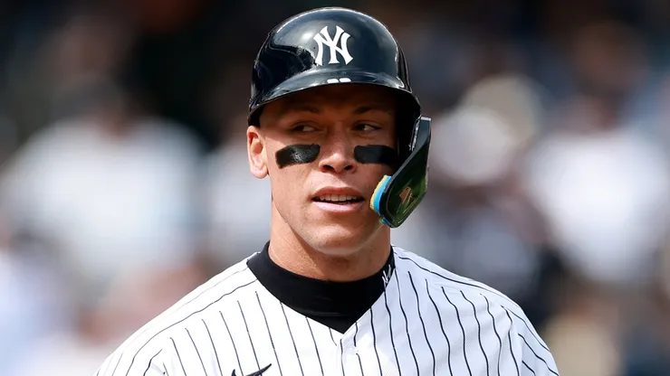 Aaron Judge #99 of the New York Yankees reacts after he is hit by a pitch.