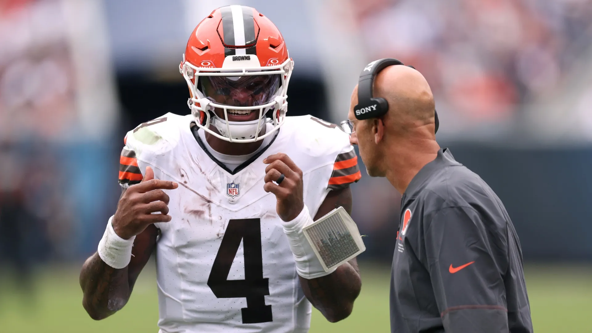 Deshaun Watson of the Cleveland Browns speaks with quarterback coach Mike Bajakian (Source: Geoff Stellfox/Getty Images)