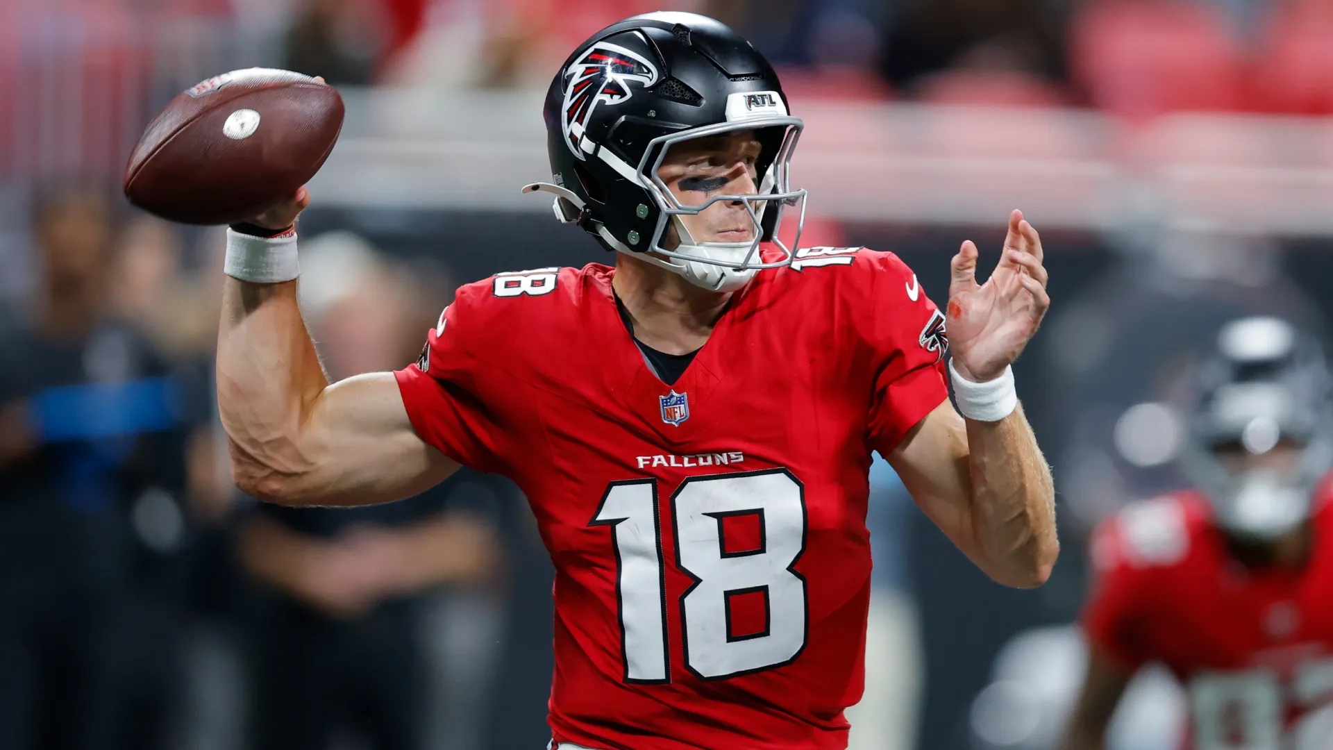 Jack Strand #18 of the Atlanta Falcons drops back to pass (Source: Todd Kirkland/Getty Images)