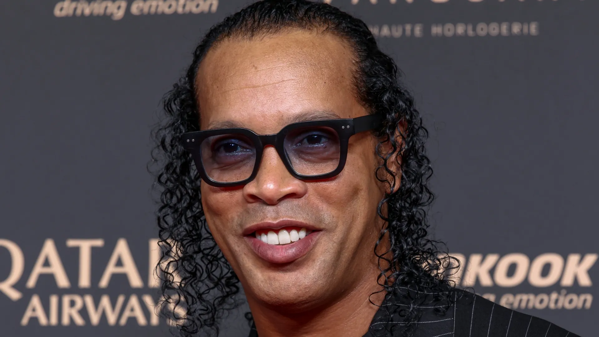 Ronaldinho posing for a photo