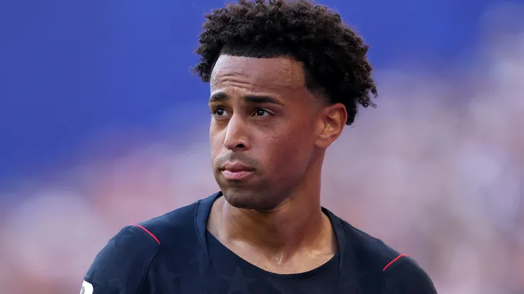 Tyler Adams #4 of the United States looks on.