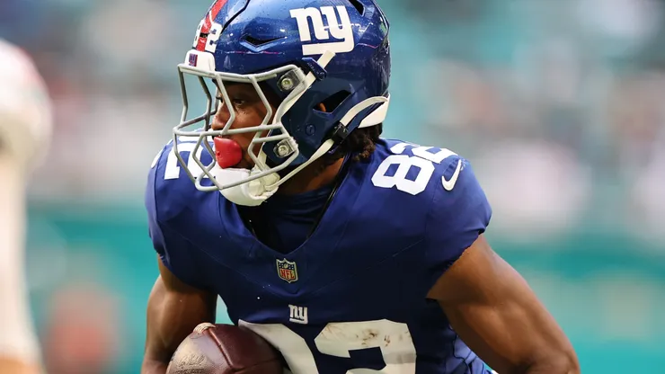 Calvin Austin III #82 of the New York Giants rushes against the Miami Dolphins.
