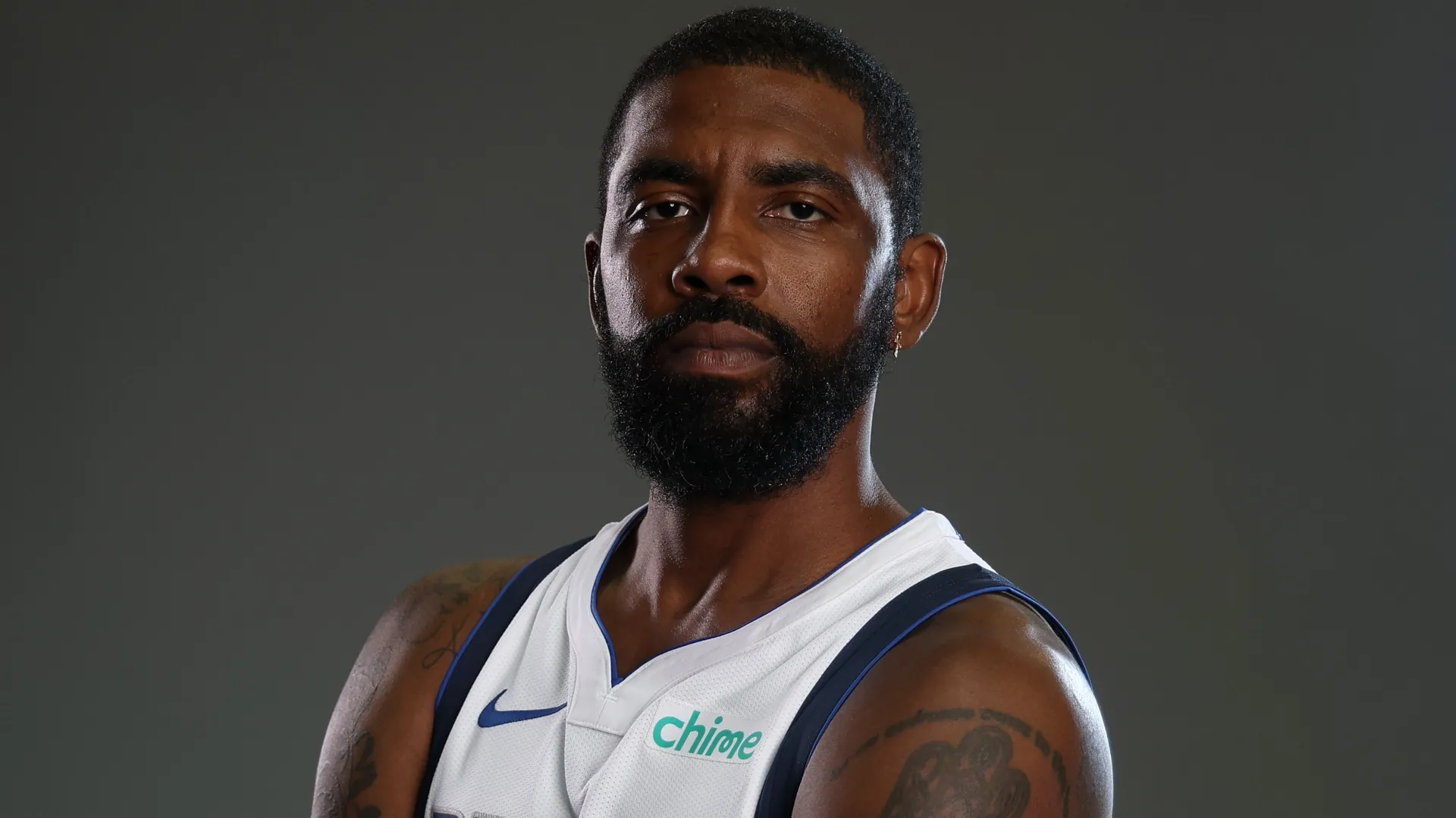 Kyrie Irving posing for a photo