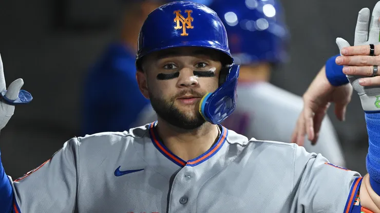 Bo Bichette #19 of the New York Mets celebrates after hitting a solo home run.