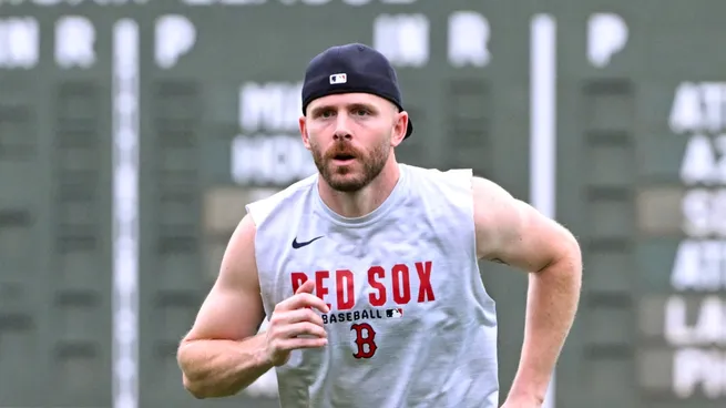 Trevor Story #10 of the Boston Red Sox runs on the field before a game against the Baltimore Orioles at Fenway Park on July 21, 2026 in Boston, Massachusetts.