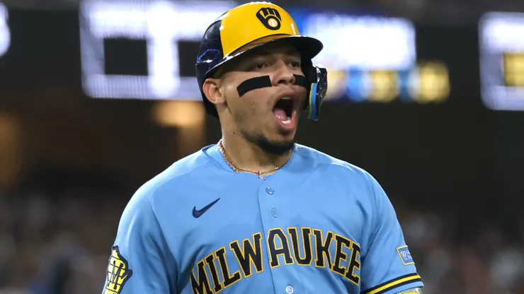 William Contreras #24 of the Milwaukee Brewers react.