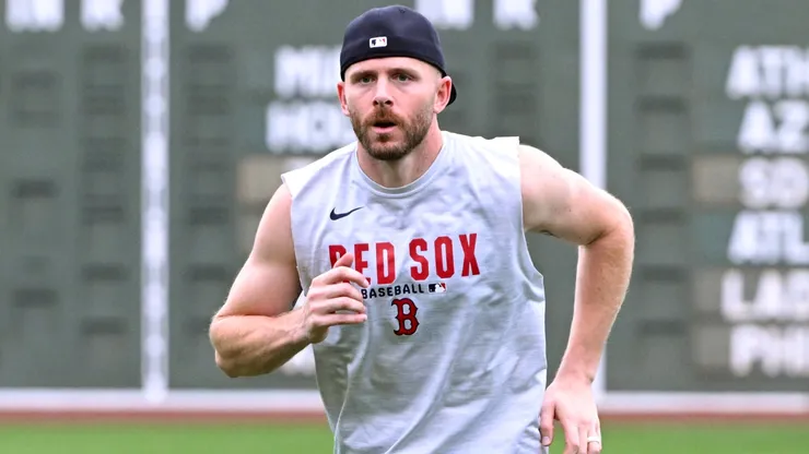 Trevor Story #12 of the Boston Red Sox runs on the field.