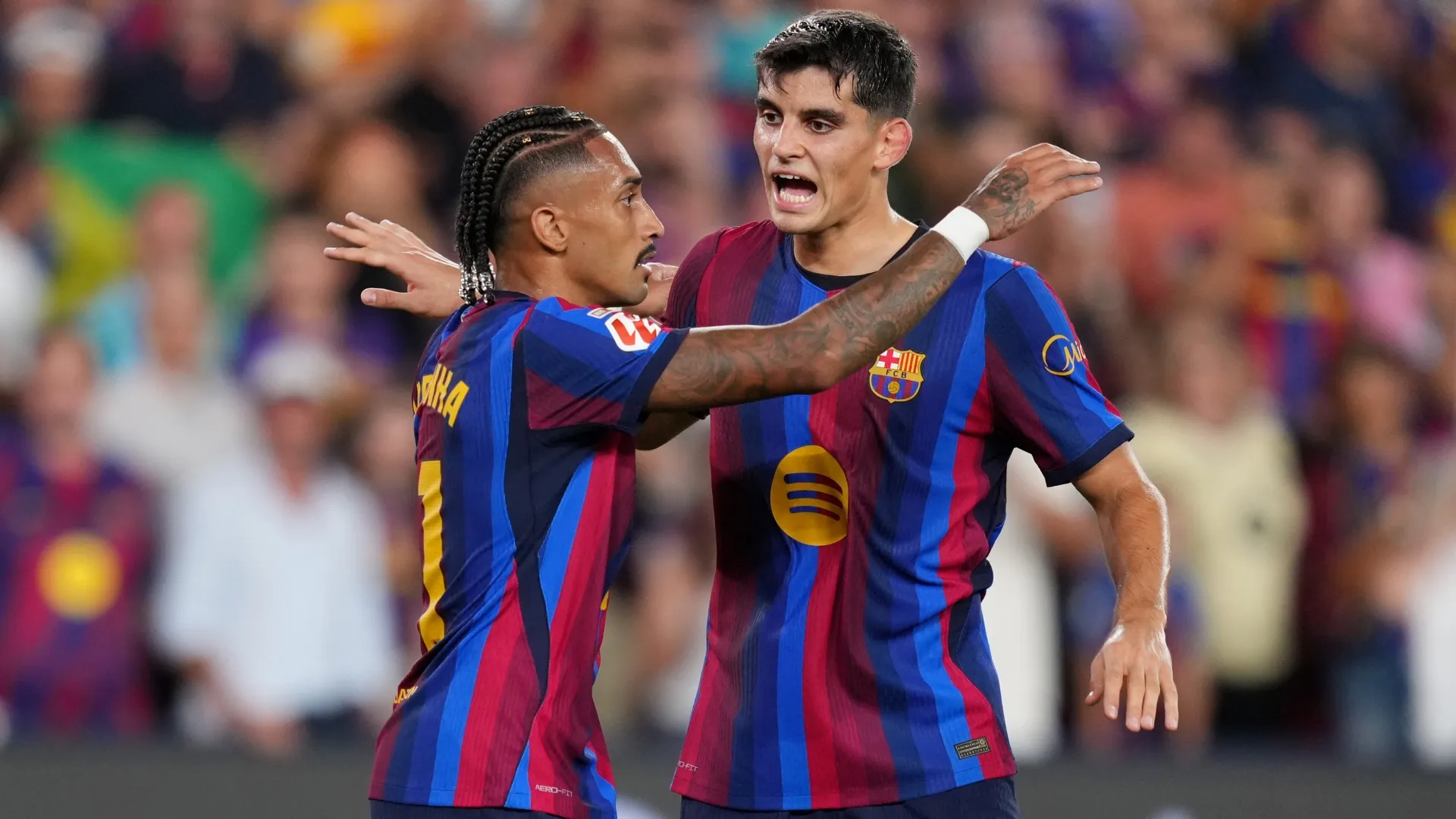 Raphinha and Gerard Martin of Barcelona during the LaLiga EA Sports 2026/27 match (Source: Alex Caparros/Getty Images)