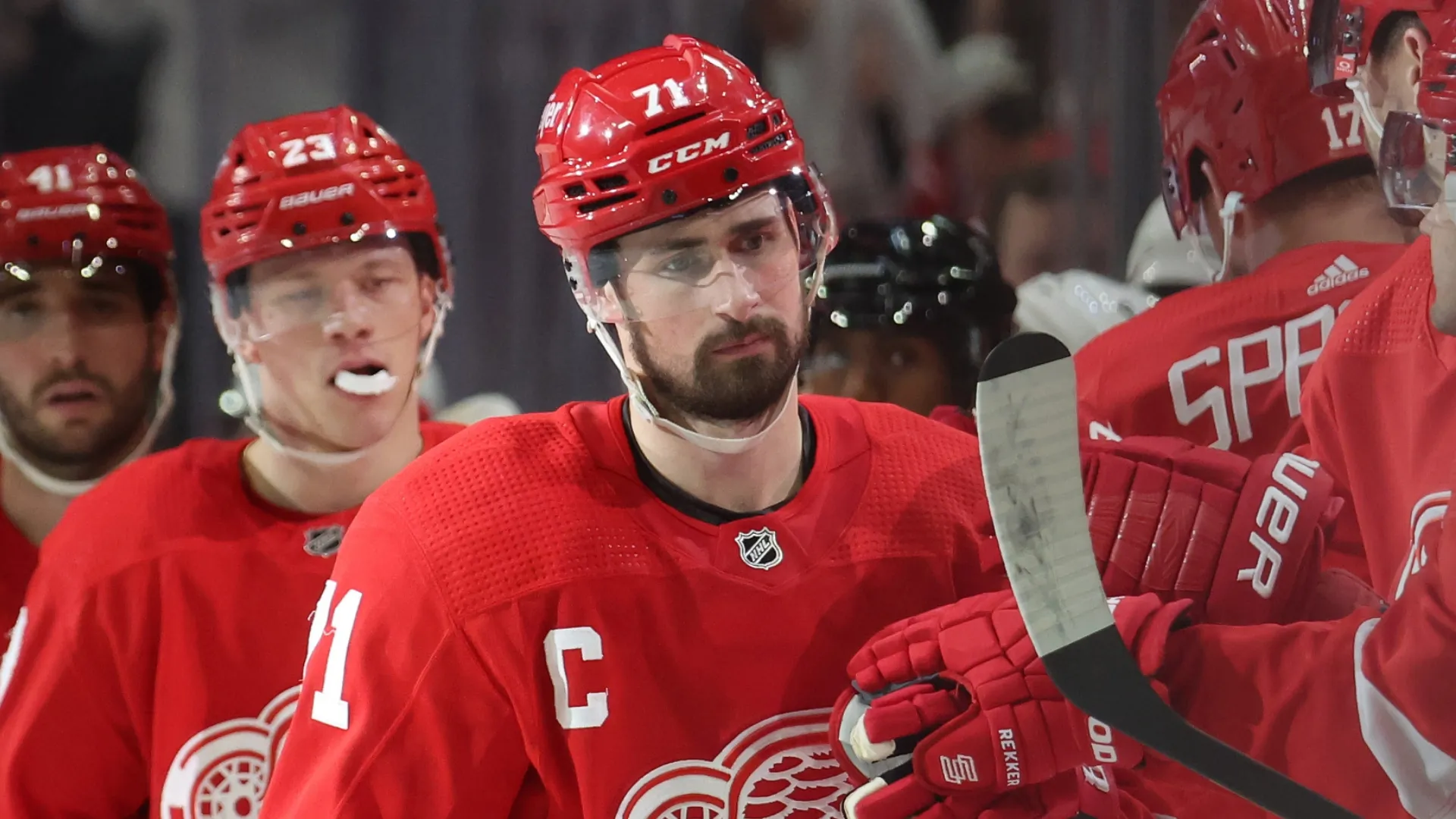 Dylan Larkin #71 of the Detroit Red Wings celebrates his third period goal with teammates while playing the Washington Capitals at Little Caesars Arena on February 27, 2024 in Detroit, Michigan.