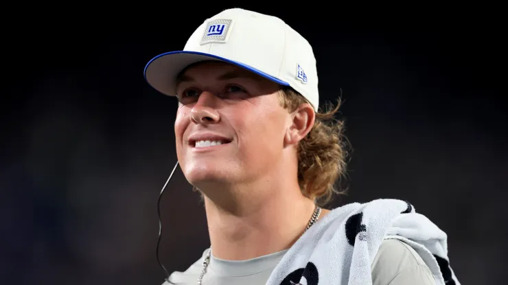 Jaxson Dart #6 of the New York Giants heads to the locker room.