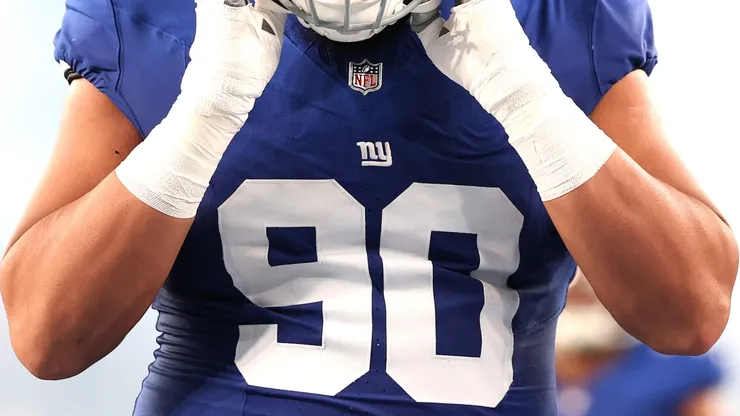Elijah Garcia #90 of the New York Giants looks on before a NFL Preseason.