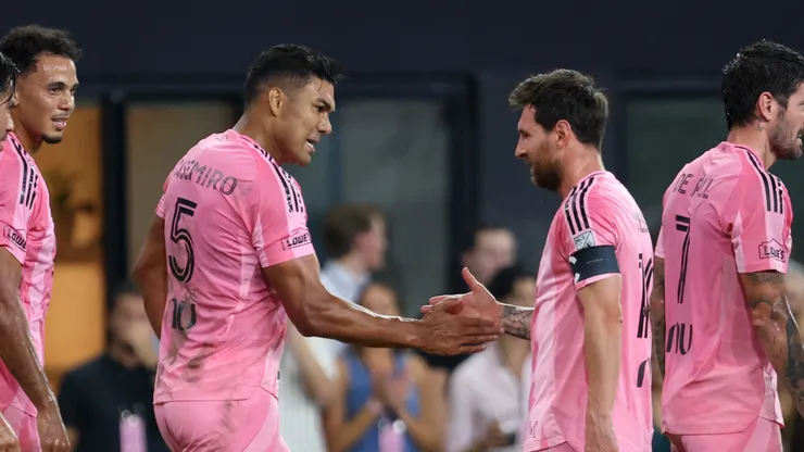 Casemiro #5 of Inter Miami CF celebrates scoring his team's first goal with teammate Lionel Messi #10.