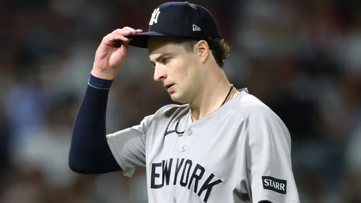 Cam Schlittler #31 of the New York Yankees walks off.