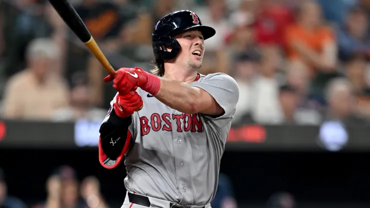 Adley Rutschman #31 of the Boston Red Sox hits a home run.