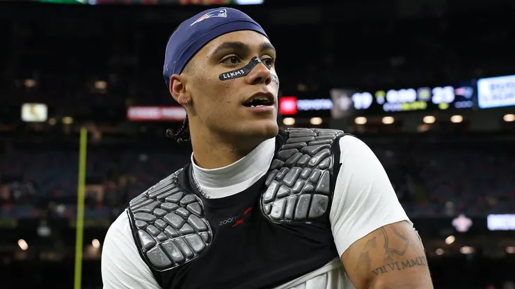 Christian Gonzalez #0 of the New England Patriots looks on.
