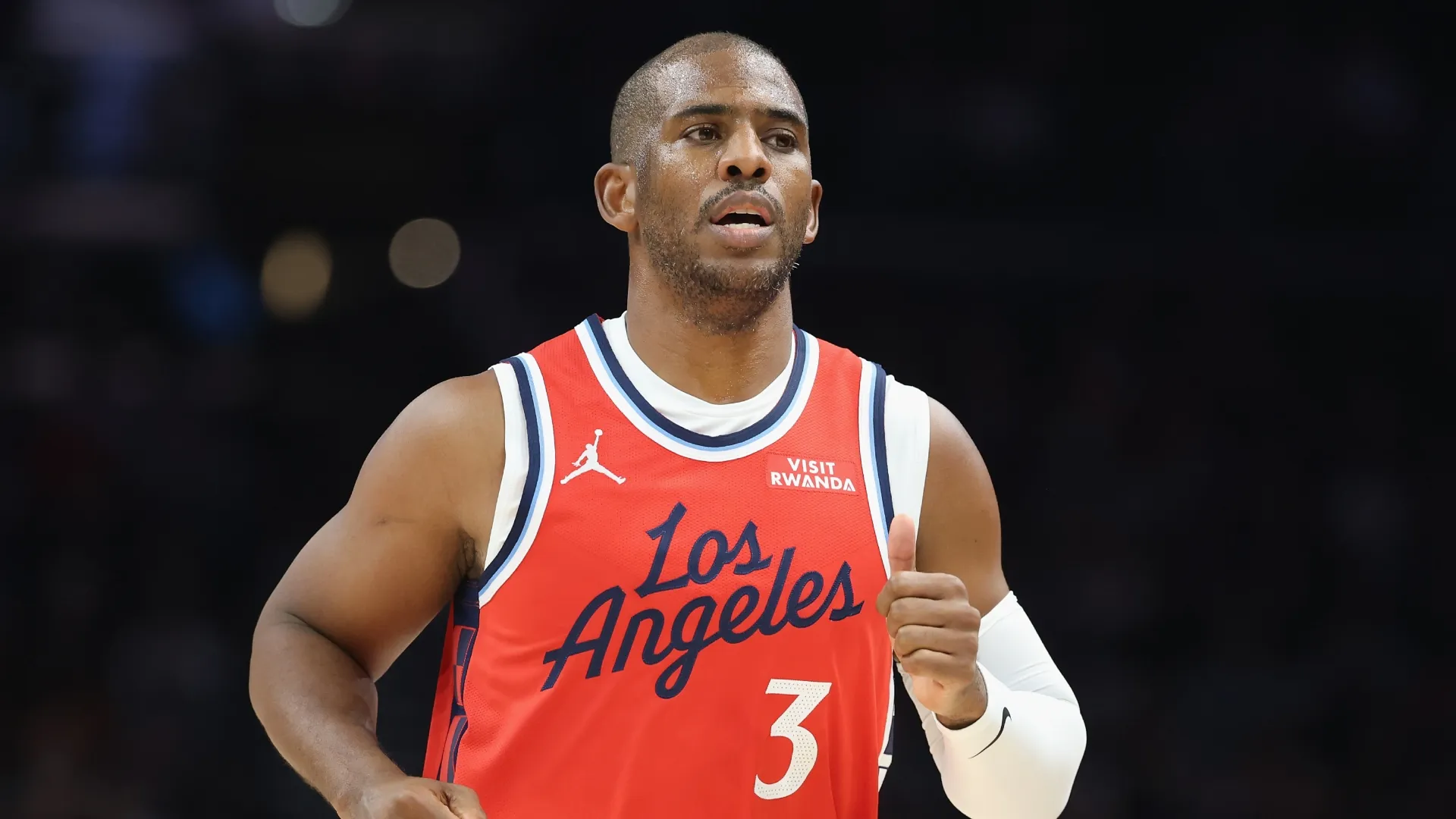 Chris Paul looks on