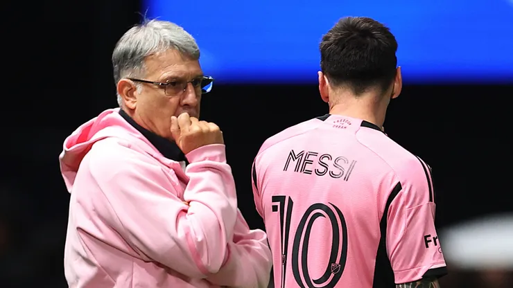 Gerardo Martino (left) and Lionel Messi during an Inter Miami game.