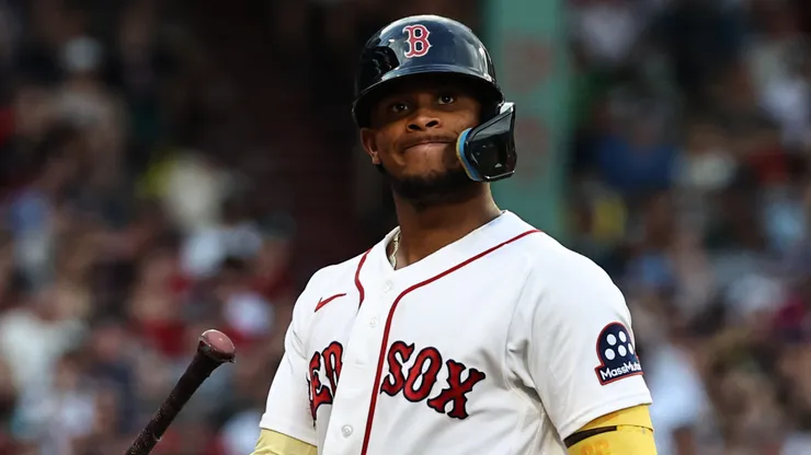 Ceddanne Rafaela #3 of the Boston Red Sox walks back to the dugout after flying out.