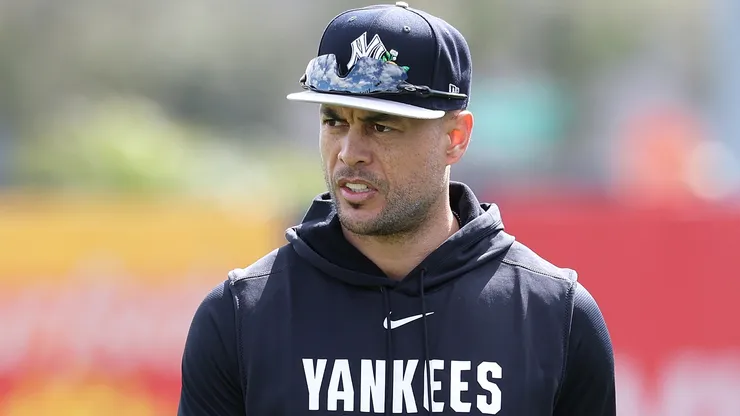 Giancarlo Stanton #27 of the New York Yankees warms up during team workouts.